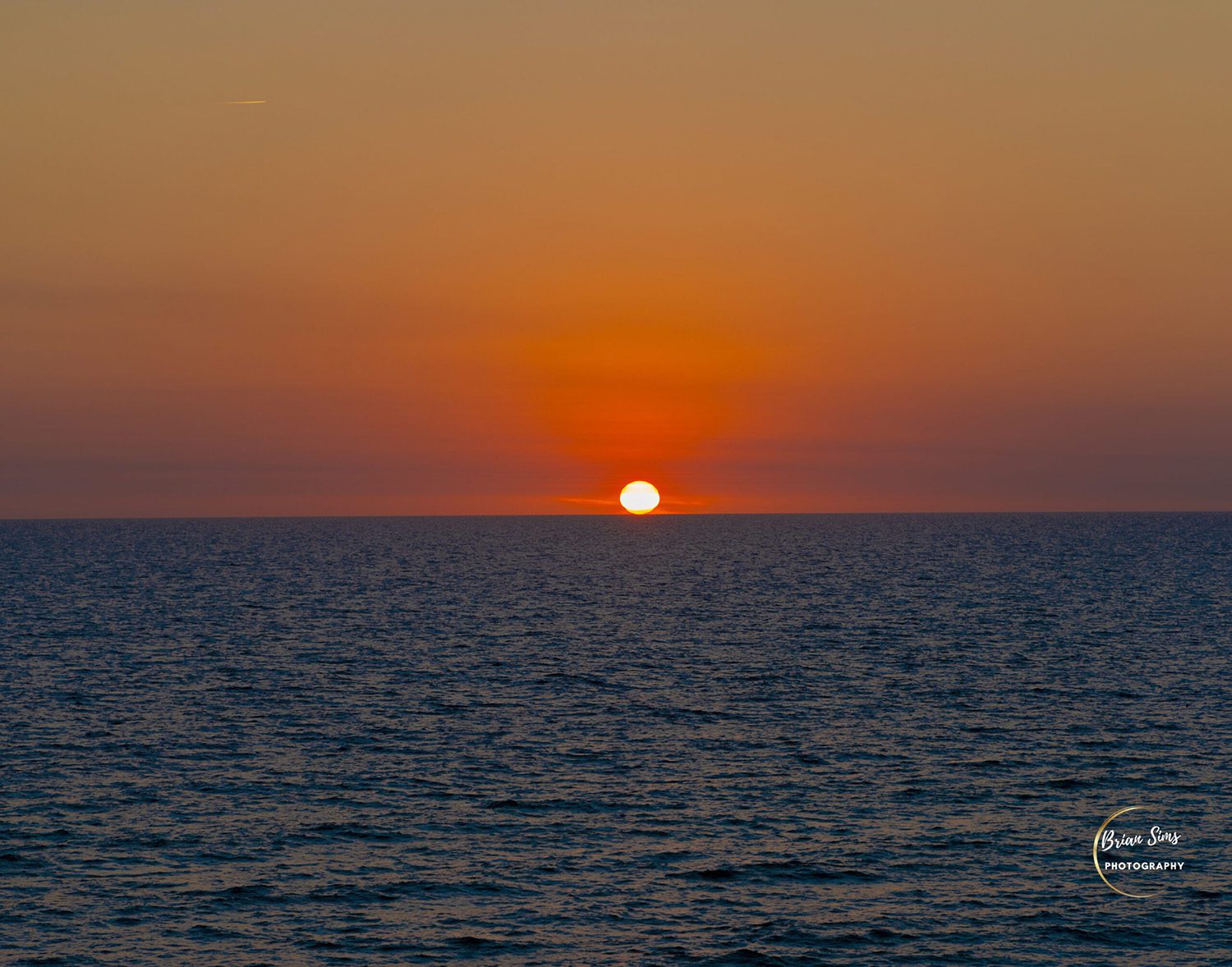 Sunset Over the Gulf of Mexico Photograph by Brian Sims Photography